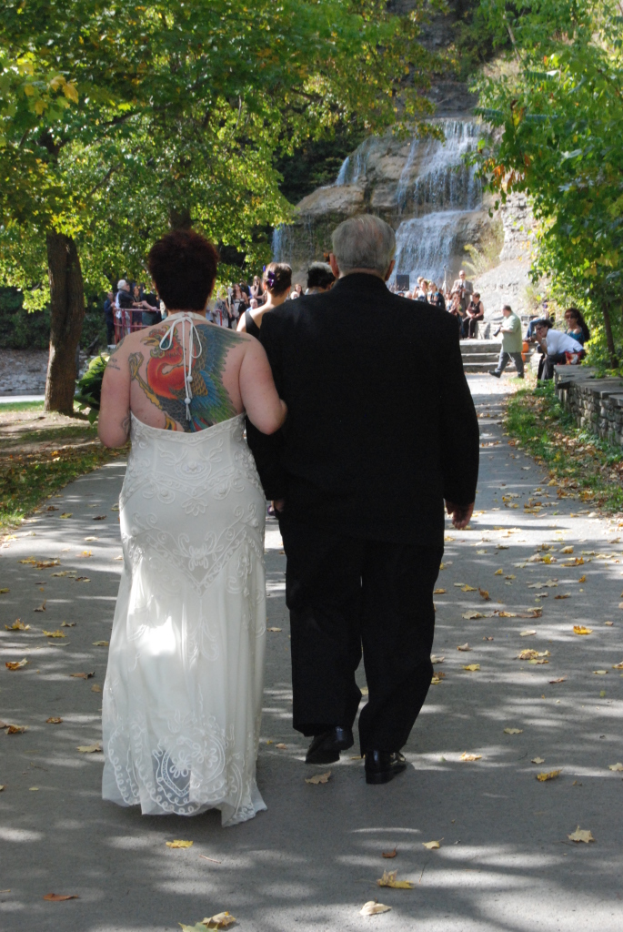Walking down the aisle, showing my artwork