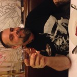 Happy husband with dry rosé and beef tartare in Paris